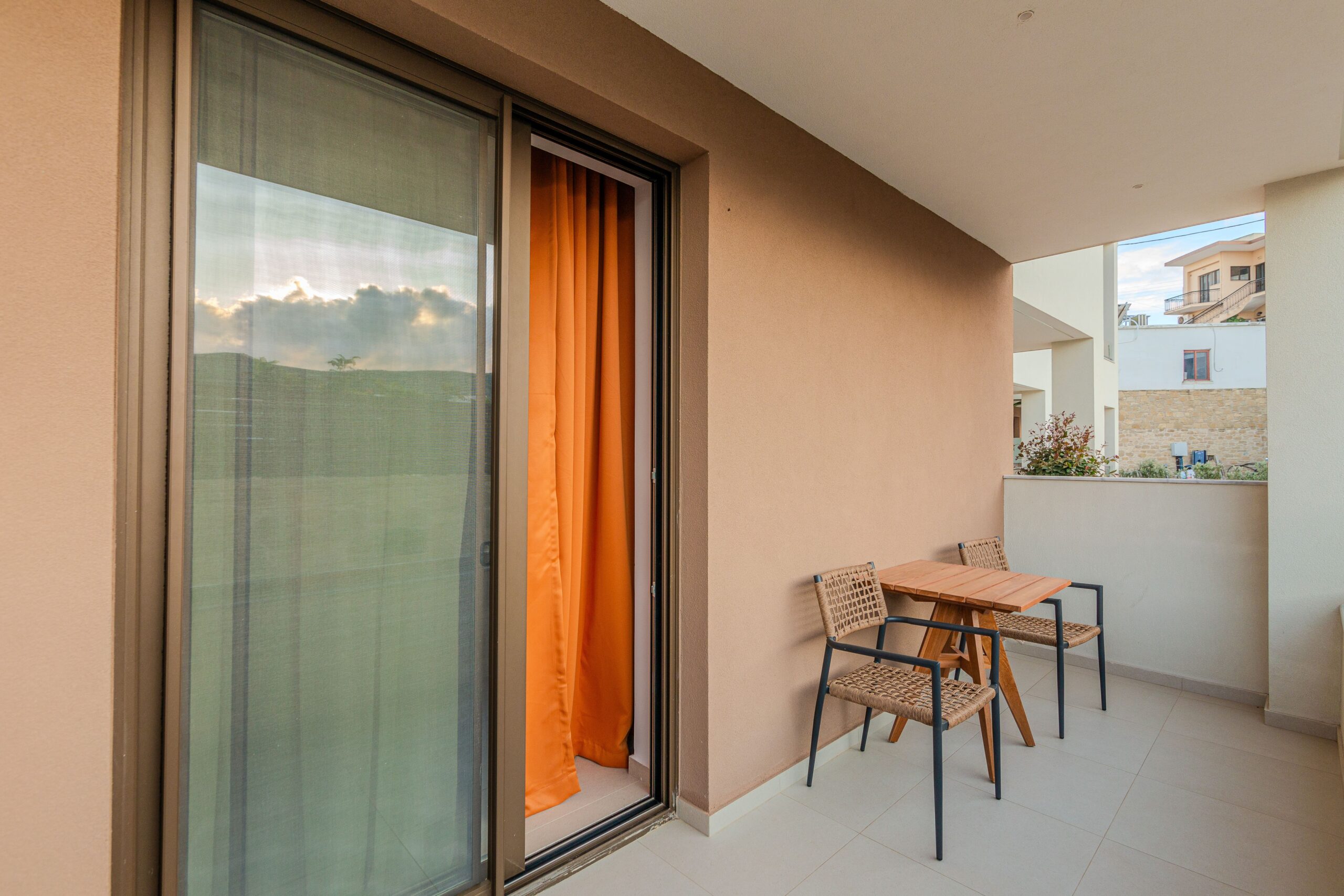 Elegant premium suites in Crete featuring private verandas and serene views